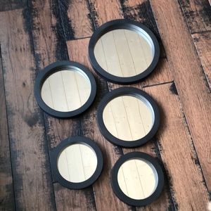 Set of five (5) round black mirrors